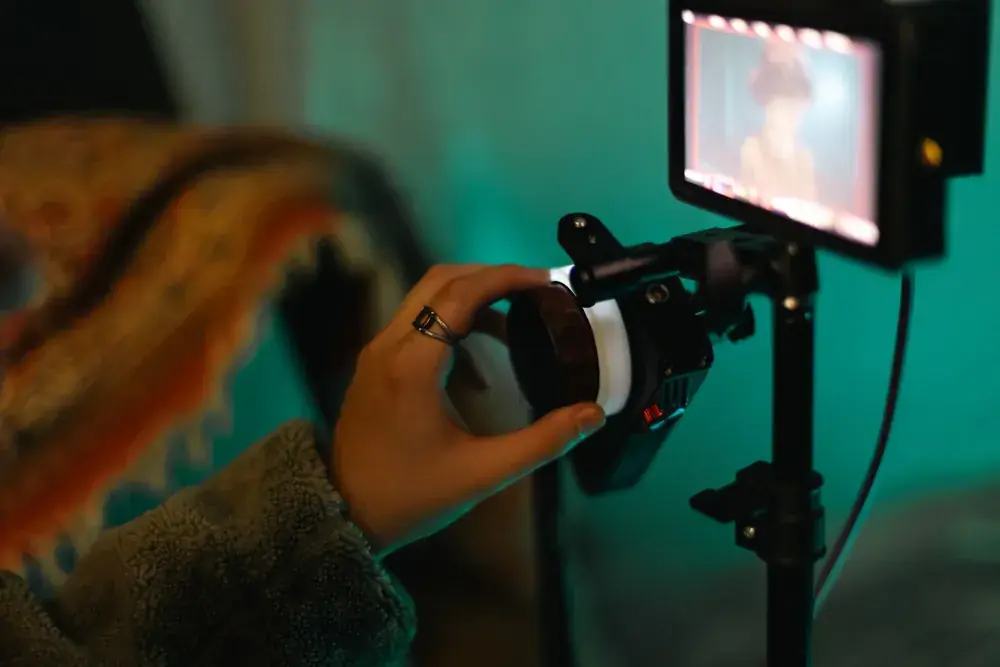 Monitor in hand showing the take