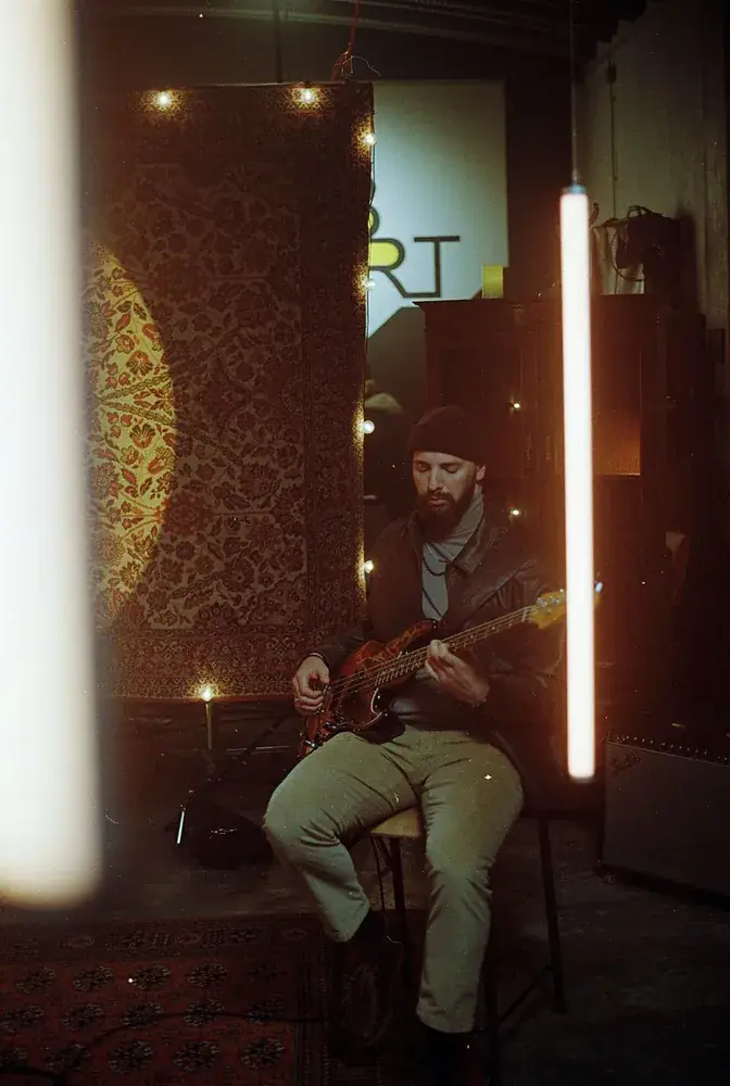 Bassist playing on the live session set